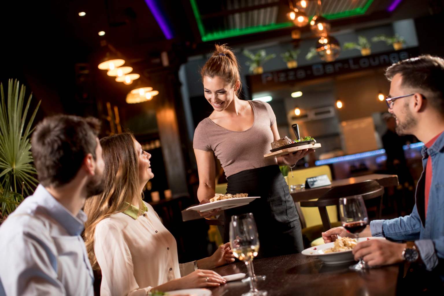 Those who always help the waiter clear the table share this trait—here’s what psychologists say about it