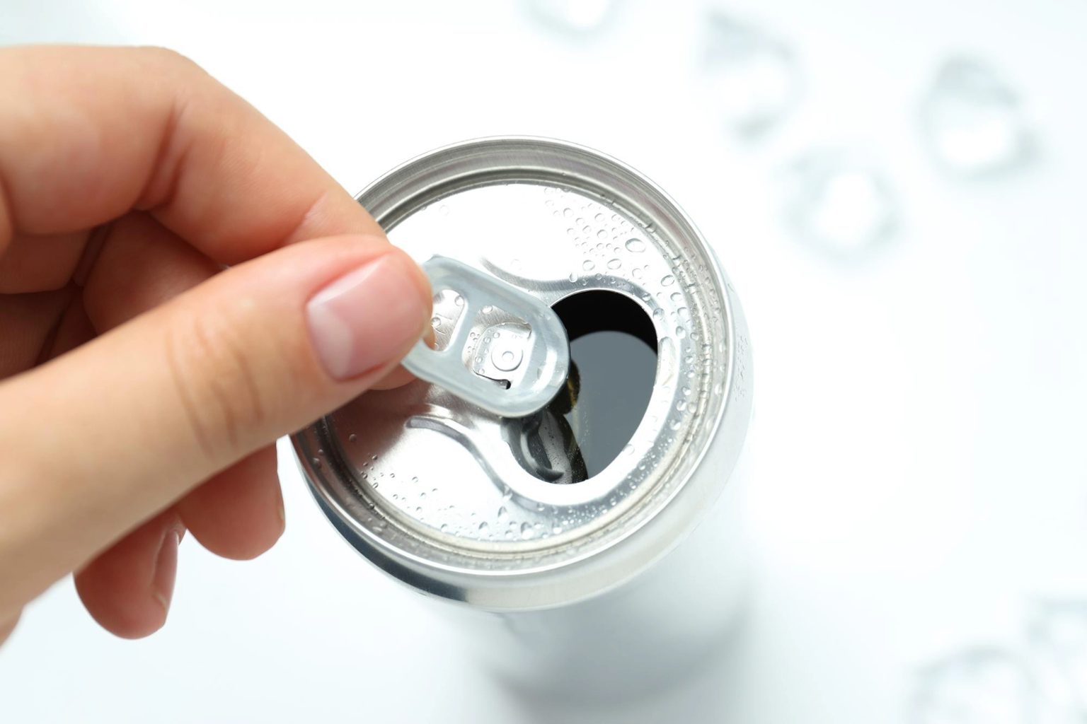 Yes, the hole in soda can tabs has a real purpose and it’s not originally for holding a straw