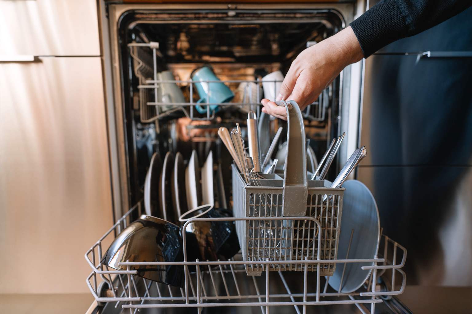 Experts resolve the dishwasher debate dividing households: utensils, handle up or down?