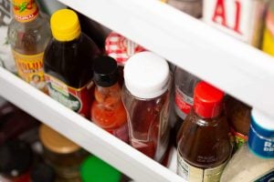 How long can you keep opened condiments in the fridge without risk?