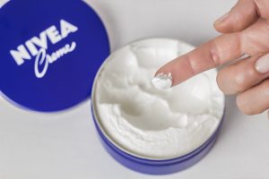 I tried Nivea’s iconic blue cream on half my face for a week – the results surprised me