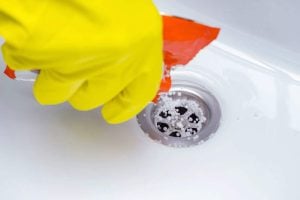 Unblock drains naturally with a plumber’s better method instead of vinegar and baking soda
