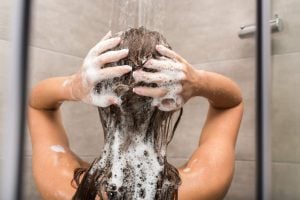 Washing your hair too rarely can be risky, warns pharmacist — here’s what you need to know