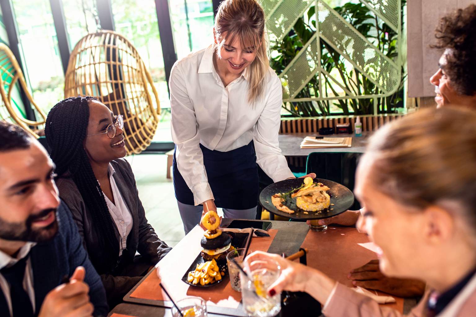 Why helping a waiter clear the table reveals much more than kindness according to psychologists