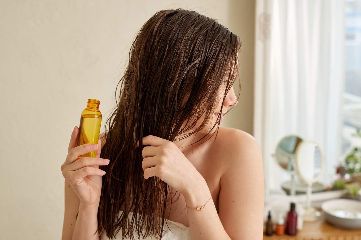 What is the purpose of applying olive oil to your hair? Experts answer